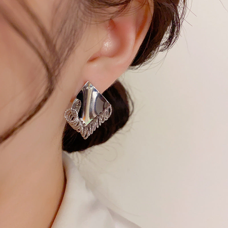 Argent Boucle d'oreille artisanal délicat