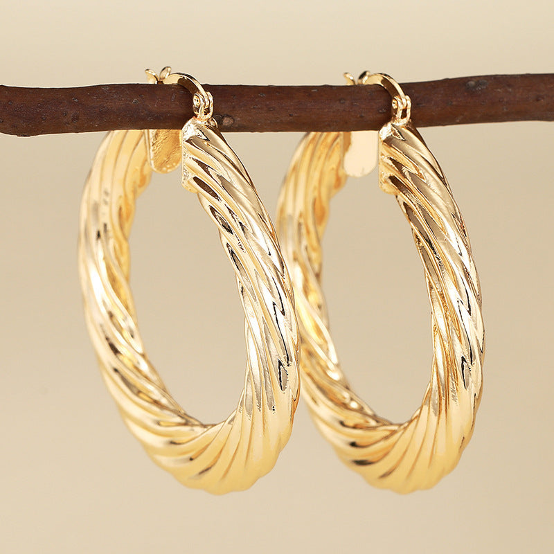 A Must-Have - Boucle d'oreille artisanal délicat